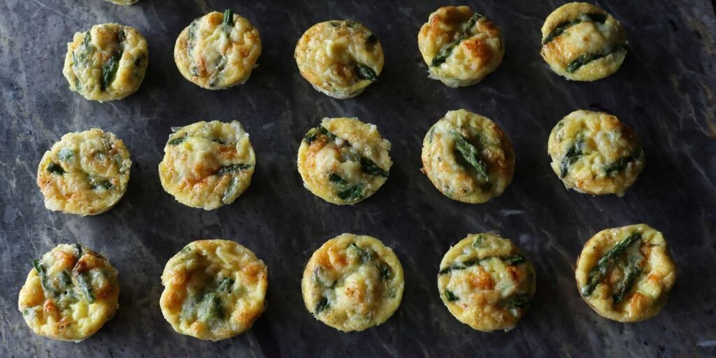 8619511 asparagus and ham quiche bites john mitzewich 2x1 3368fdfbd2704f98aacf2e7a66a9ef77 (1)