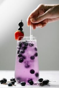 Chilled blueberry lemonade served with lemon slices and ice – perfect summer drink.